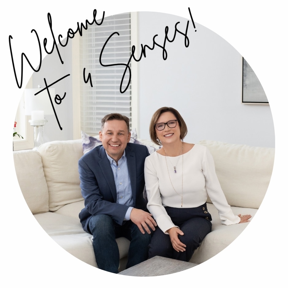 Mariusz and Ewa, owners of 4 Senses House Cleaning, sitting together in a Fitchburg, WI home setting